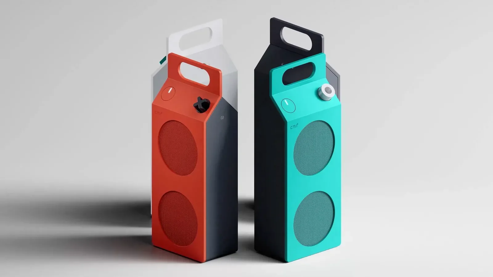 Empat unit CMF Speaker M, oren dan turquoise di depan, putih dan kelabu gelap di belakang, dengan pemegang di atas