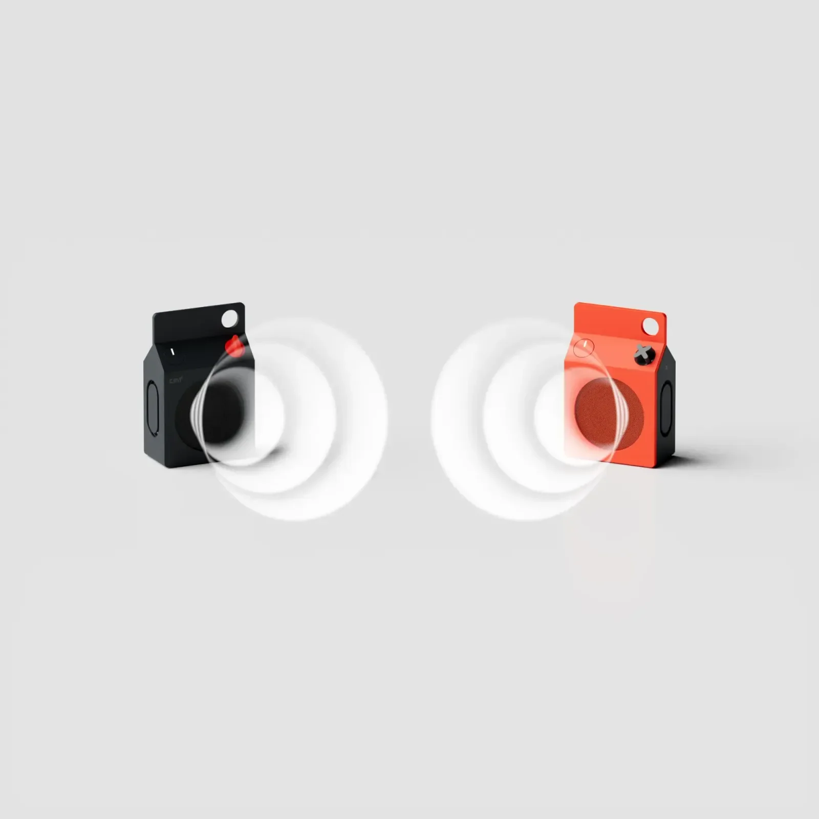 Dua unit CMF Speaker S kelabu gelap dan oren dengan gelombang bunyi menunjukkan Stereo Mode