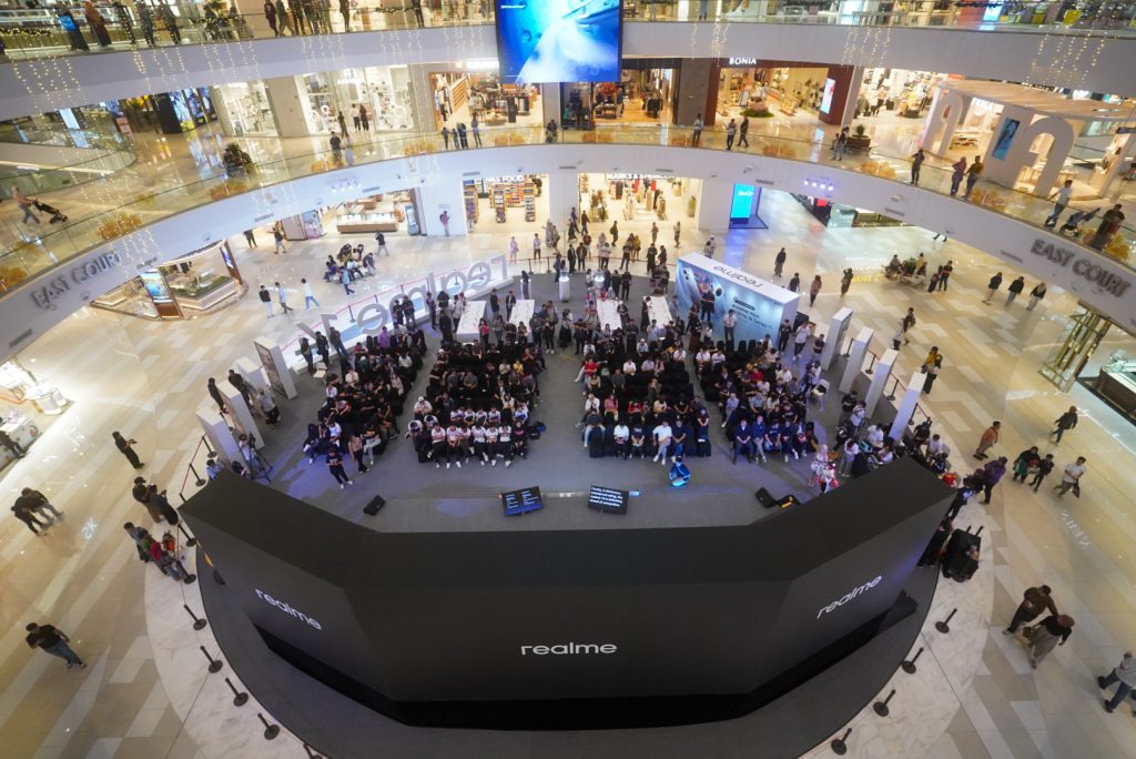 Overhead view of the Realme stage and crowd at IOI City Mall East Court